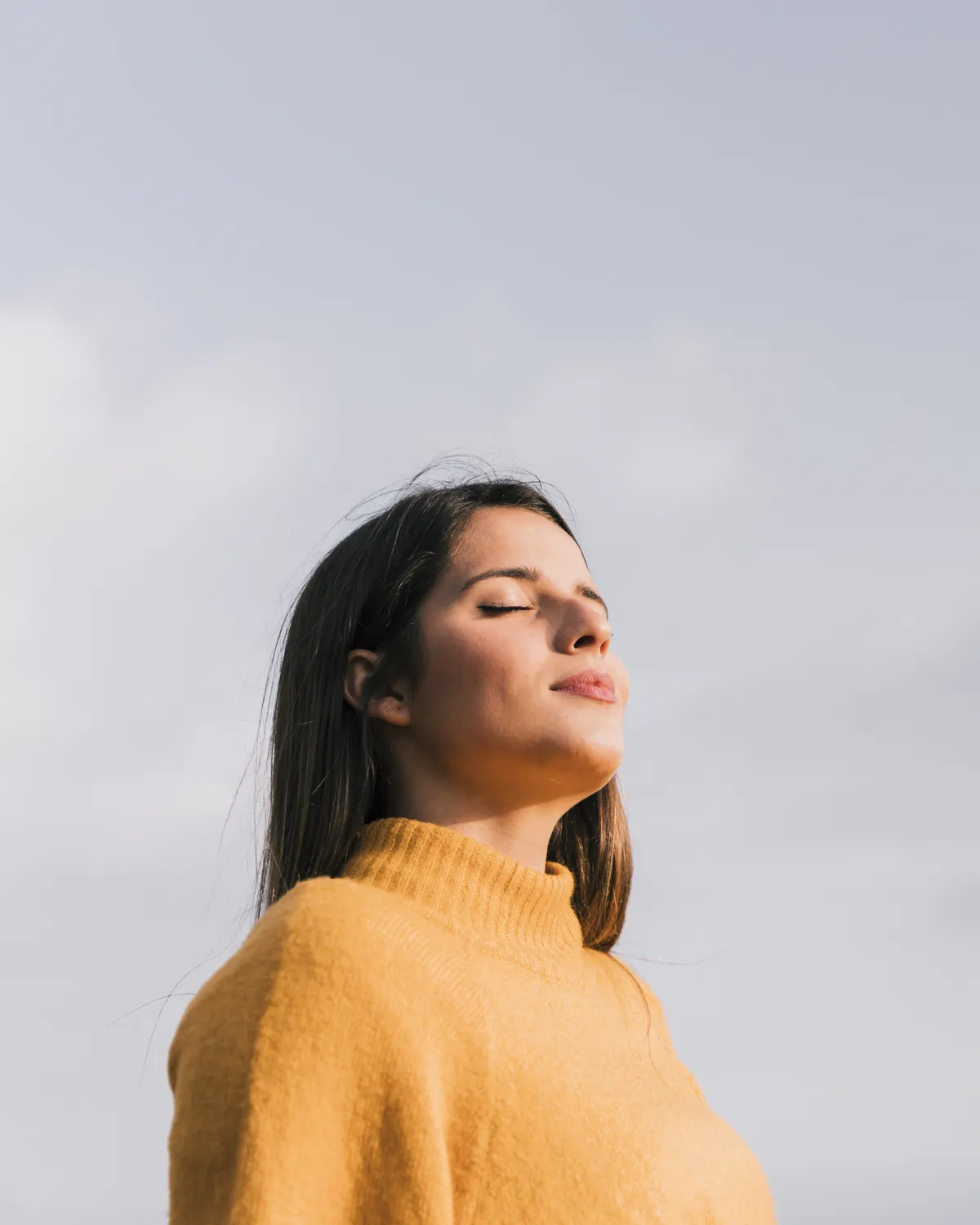 Femme qui fait un exercice de respiration